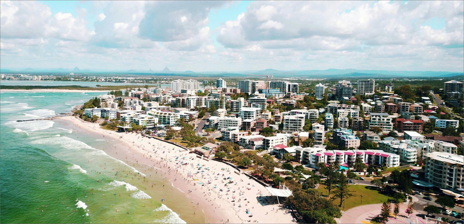 Sunshine Coast city and mountain backdrop